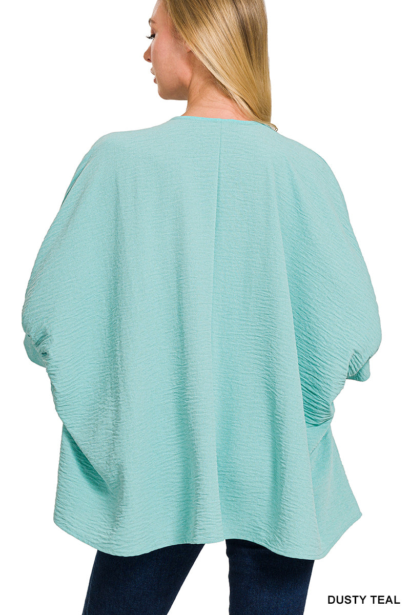 Woven V-Neck Puff Half Sleeve Top