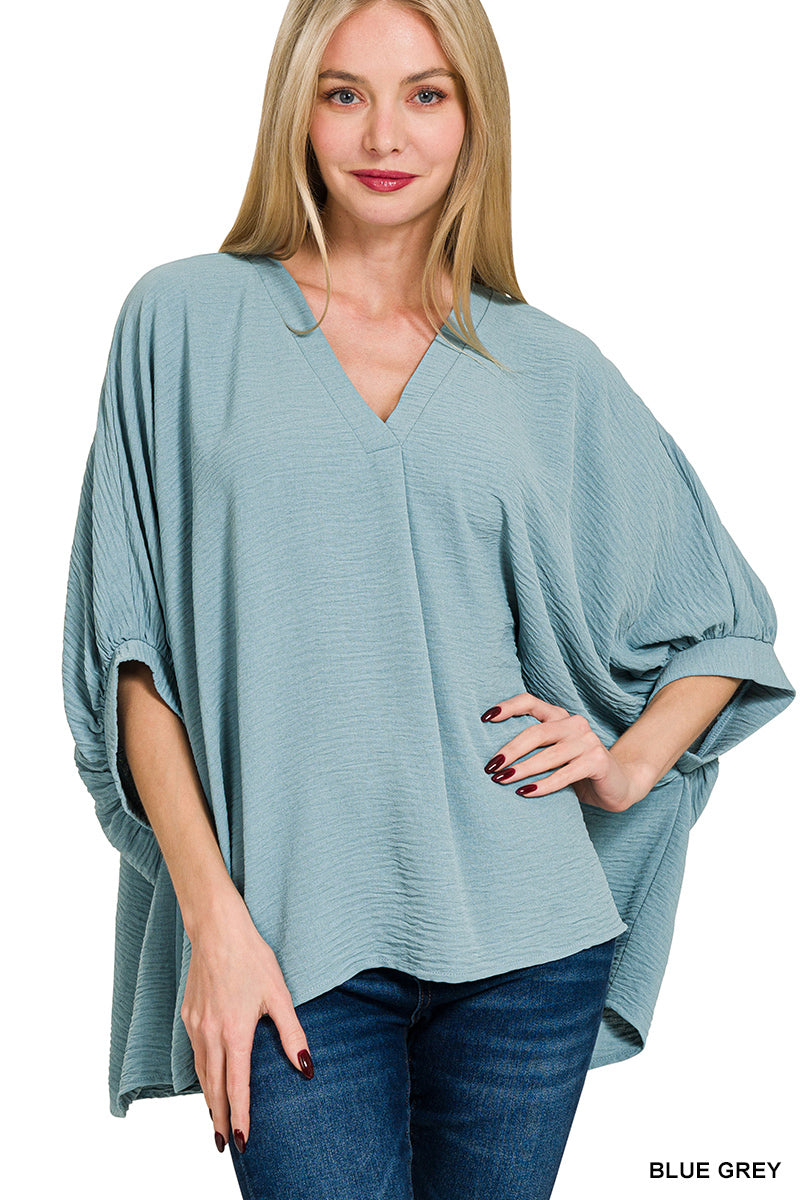 Woven V-Neck Puff Half Sleeve Top