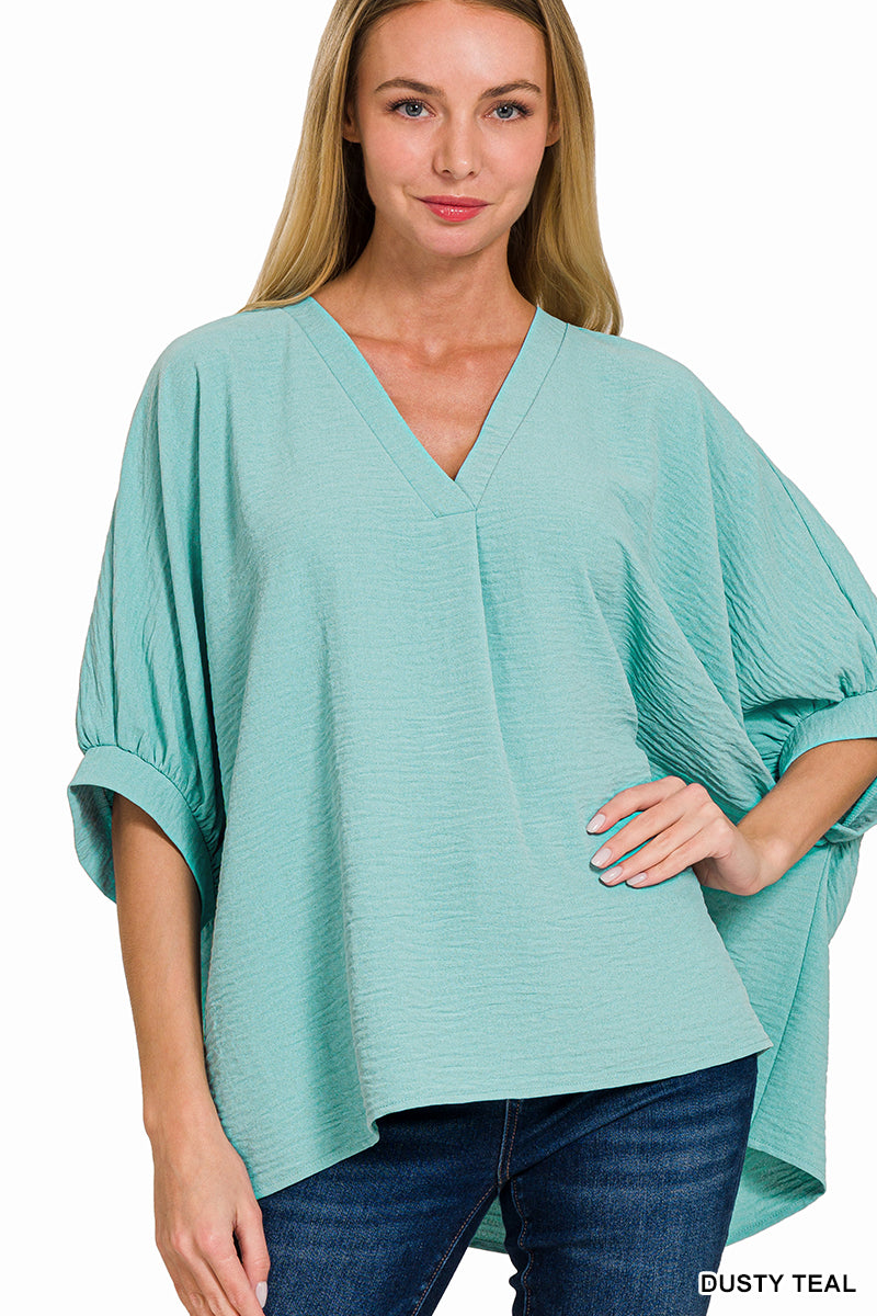 Woven V-Neck Puff Half Sleeve Top