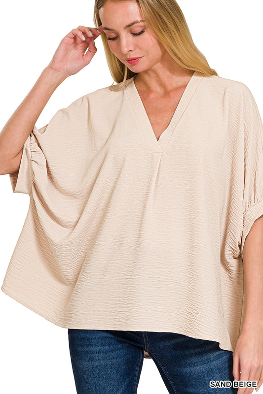 Woven V-Neck Puff Half Sleeve Top