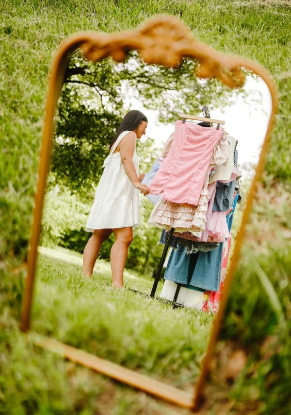 Hallie and Company boutique sign featuring the cute but comfy clothing tagline